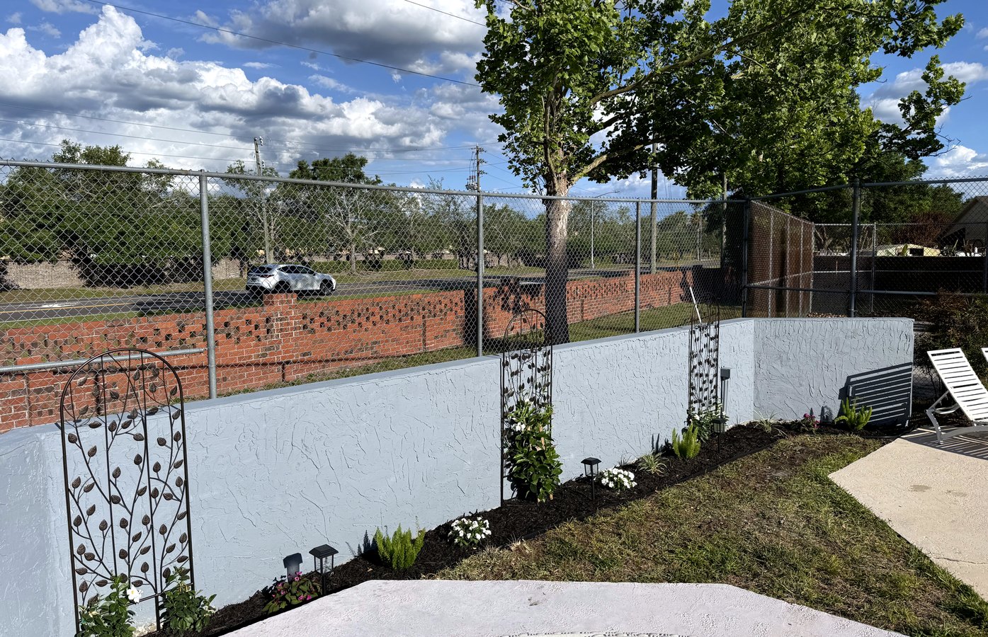 Cabana and pool area beautification with trellises and new plantings