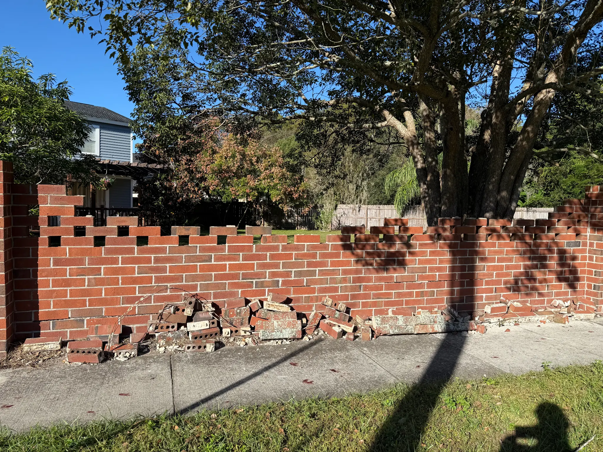 Collapsed wall section with fallen bricks